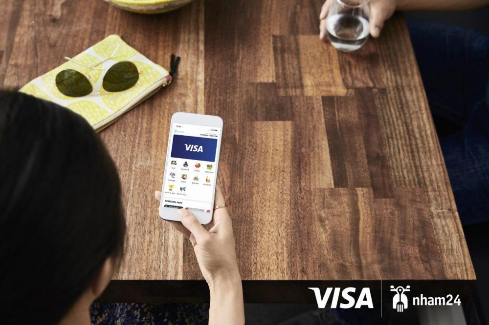 Visa និង Nham24 បានដាក់ឲ្យប្រើប្រាស់ការទូទាត់តាម Visa កាត ជាមួយមុខងារដាក់ Visa កាត ជាជម្រើសអាទិភាព (card-on-file) ដើម្បីធ្វើឲ្យការបង់ប្រាក់តាមប្រព័ន្ធអ៊ីនធឺណេត កាន់តែរហ័ស ងាយស្រួល និង សុវត្ថិភាព