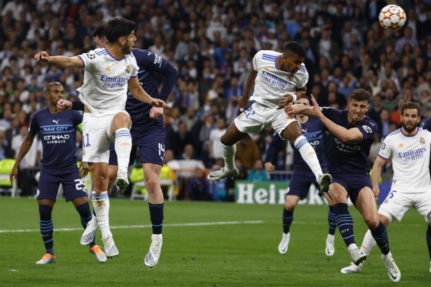 Rodrygo និង Benzema ធ្វើអោយលោក PEP GUARDIOLA ស្រកទឹកភ្នែកនៅវគ្គពាក់កណ្តាលផ្តាច់ព្រ័ត្រ Champions League